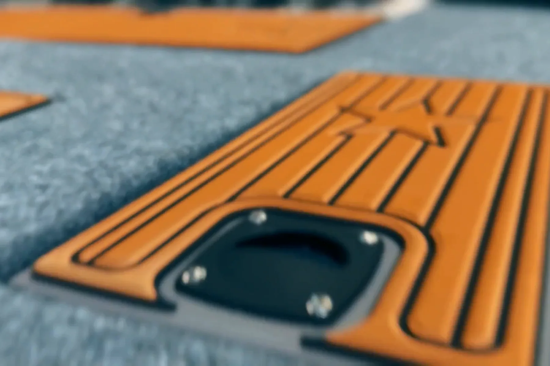 Precision hatch cut-out in orange and grey EVA decking