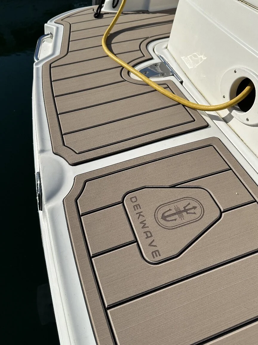 Two-tone EVA swim platform with a routed DekWave logo